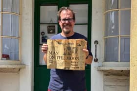 Sam Draper with a copy of the newspaper from 1969