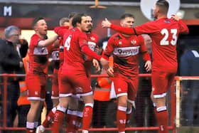 The Kettering Town players celebrate Connor Kennedy's opening goal in the 2-0 win over York City. Picture by Peter Short