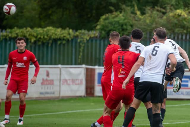 Jack Keeble heads home Corby's equaliser at Anstey (Picture: Jim Darrah)