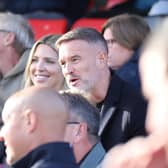 Brad Piercewright sat with supporters at Kettering Town's 1-1 draw with Halesowen last Saturday (Picture: Peter Short)
