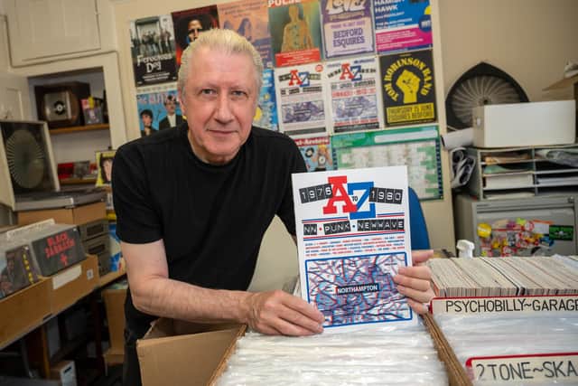 Alex Novak with a copy of new book NN Punk New Wave 1976-1980.