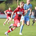 Callum Stead runs with the ball during Kettering Town's 1-0 win over Gloucester City on Good Friday, in which he scored the only goal from the penalty spot. Picture by Peter Short