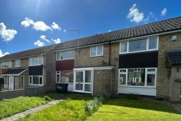 This sweet mid-terrace on the Shire Lodge estate has three bedrooms, a bathroom and its own garden. It was last sold for £207,000 in July 2022.