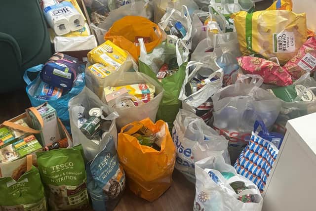 Food Bank donations taking over the salon!