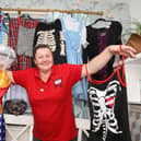 Kelly Mercer with some of the costumes that can be hired for £2
