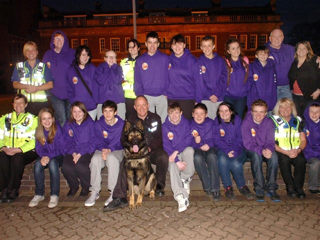 Members of the Jam team pictured with Police dog handler Ian McDonald and his dog.
April 2011