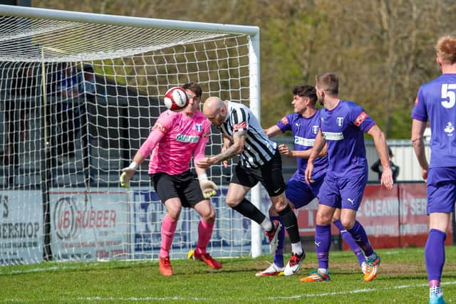 James Clifton headed Corby Town into the lead against Daventry Town but the day ended in a disappointing 3-1 defeat for the Steelmen. Picture by Jim Darrah