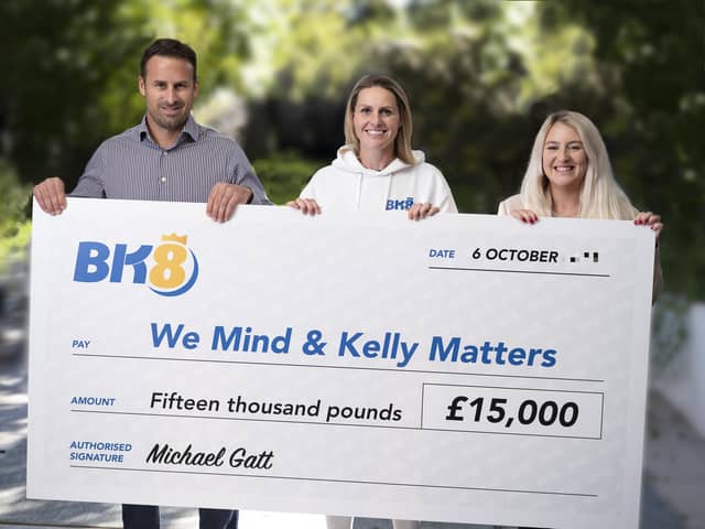 The previous donation by BK8 made last year to We Mind & Kelly Matters.  
Pictured left to right is: BK8 European Managing Director Michael Gatt with We Mind & Kelly Matters Patron Kelly Smith and Amy Hewitt from We Mind & Kelly Matters.