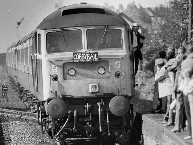 Crowds line the platform for the first train at Corby station in 18 years in 1984