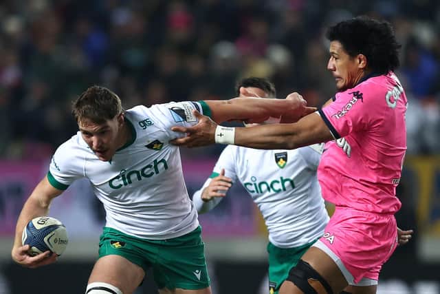 Tom Lockett (photo by ANNE-CHRISTINE POUJOULAT/AFP via Getty Images)