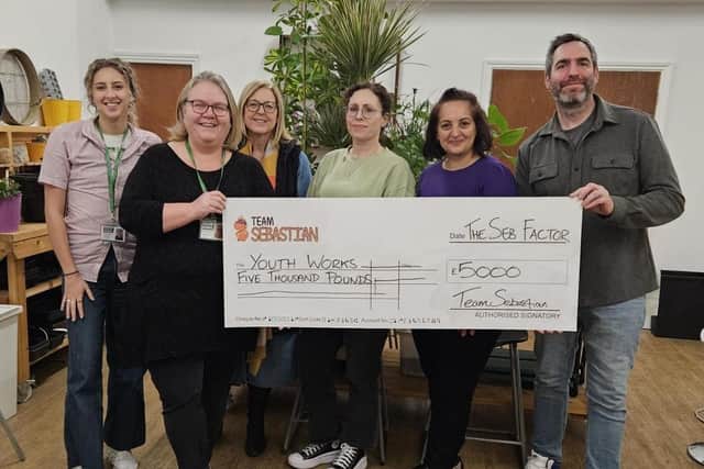 Gregg and Lindsay Nunney present the £5,000 from Seb Factor to Youth Works/Seb Factor