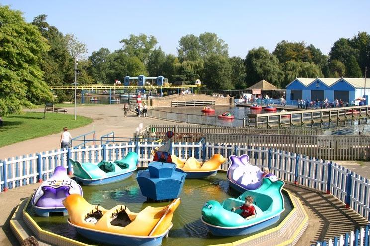 Wicksteed Park Splashing Seals in foreground with Bumper Boats and Monorail helicopters