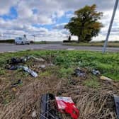 Debris from crashes at the site strewn in a nearby field