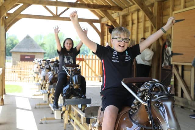 Kettering, Wicksteed Park, new ride Jolly Jockeys Charlie Parkes and sister Chloe /National World