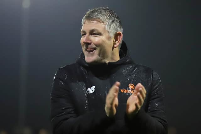 Lee Glover was a happy man at the full-time whistle as Kettering Town beat Gloucester City at Latimer Park to move into the third round of the Isuzu FA Trophy. Pictures by Peter Short