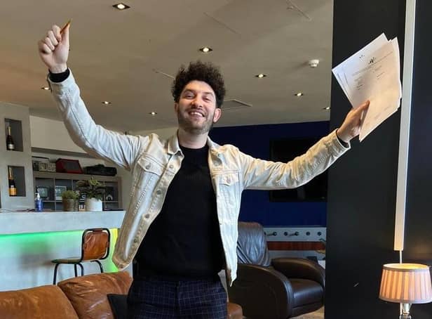 Billy Lockett celebrates signing a record deal for the release of his debut album.