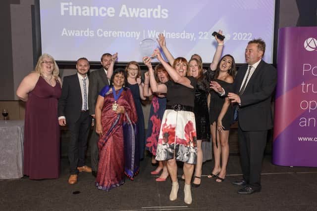 AFP Services staff celebrate their win