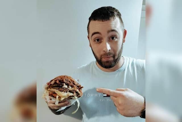 Ashley Kelland-Needle with one of his smash burgers.