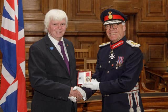 David Woods of Woodford receiving his BEM from the Lord Lieutenant of Northamptonshire