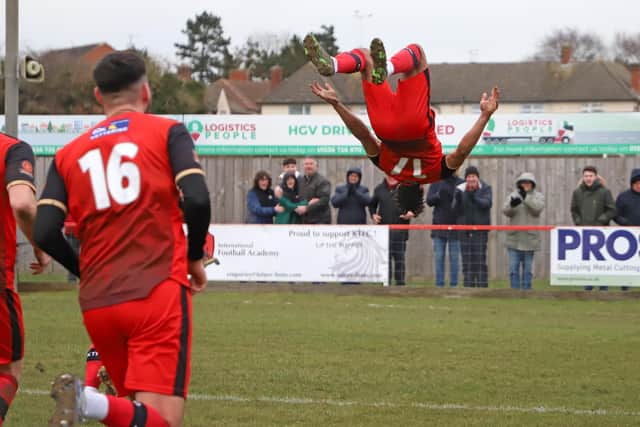 Decarrey Sheriff celebrates in style after scoring from the penalty spot