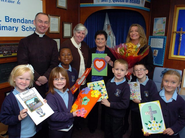 St Brendan's Primary School, retirement of school bursar after 23 years. L-r back row Father Gerard Byrne, Sister Stephanie (former headteacher), Rosaleen Davies, Teresa Morrison ( head) l-r Mary Logue, 6, Cara McNeill, 6, Marvin Camara, 6, Declan Gardeckie, 6, Connor Cowell, 7, Ava Robb, 6.   2011