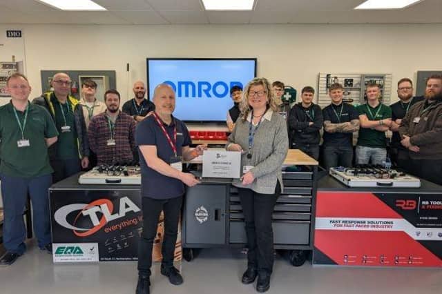 Rachel Roberts, The Bedford College Group, presents partnership plaque to Wayne Corp, OMRON.
