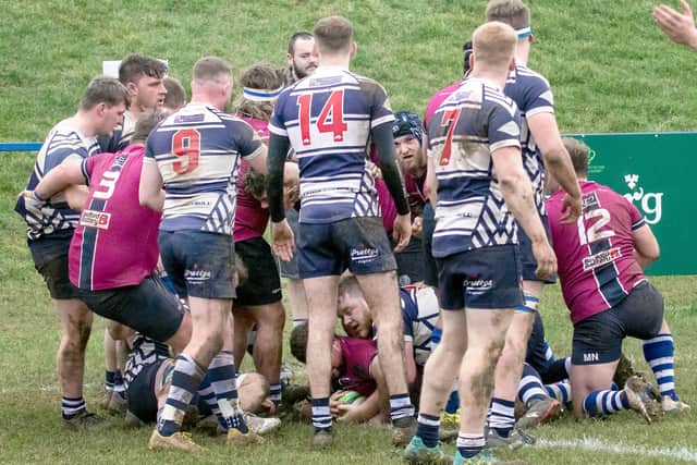 Kettering crash over the line for a try in their victory against Leighton Buzzard