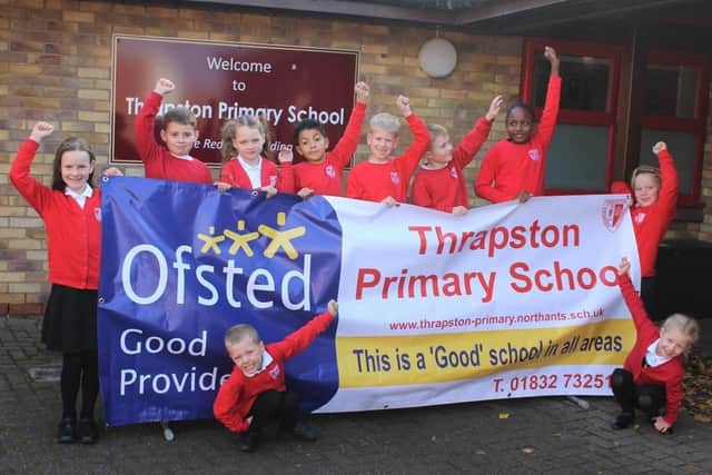 Pupils from Thrapston Primary School celebrate the 'good' rating