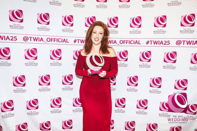 Charlotte Stokes accepts National Caterer of the year award for Portfolio Events Catering