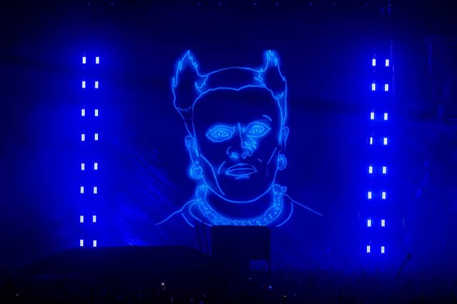 The image of Keith Flint was projected on the screens during Firestarter at the Warrior’s Dance festival on Saturday, August 22, 2026. Photo by David Jackson.