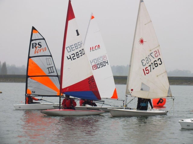 Sailing at close quarters during a race start.
