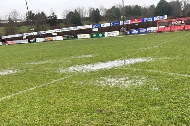 Heavy rain overnight left Kettering Town's Latimer Park pitch waterlogged