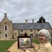 Carole returning the painting to Chester House Estate