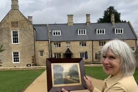 Carole returning the painting to Chester House Estate