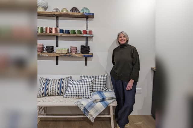 Jessica Higgins inside her new store