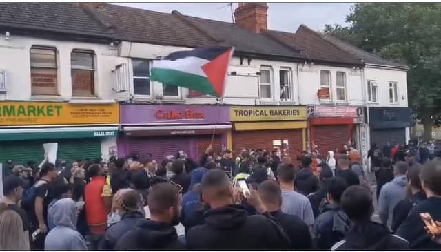 The counter-protest began chanting and cheering around 9pm with no sign of the planned far-right demonstration