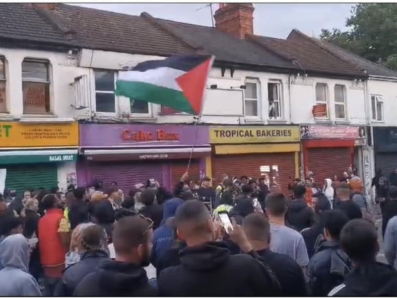 The counter-protest began chanting and cheering around 9pm with no sign of the planned far-right demonstration