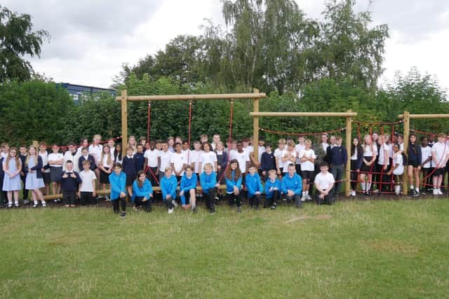 Year 6 pupils and the new trim trail at Millbrook Junior School