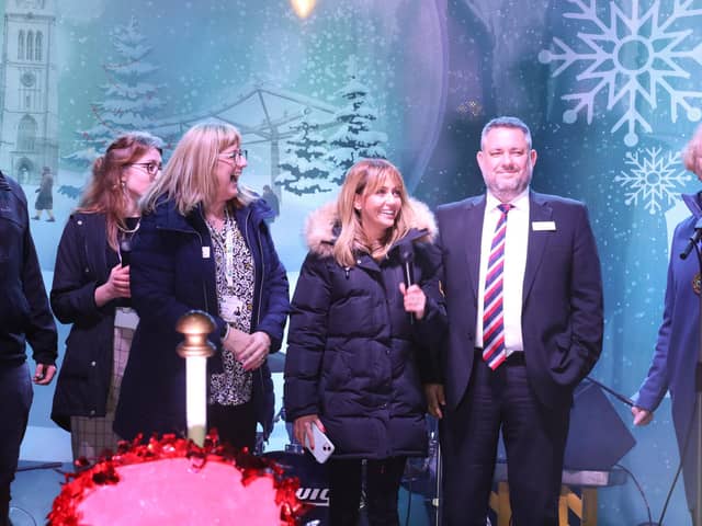 Samia Longchambon, centre, next to NNC leader Jason Smithers at last year's big switch-on
