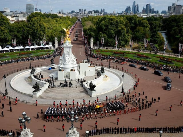 The Queen's funeral cortege passes Buckingham Palace