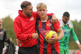 Lawson D'Ath congratulates hat-trick hero Eddie Panter after Monday's game (Picture: Peter Short)