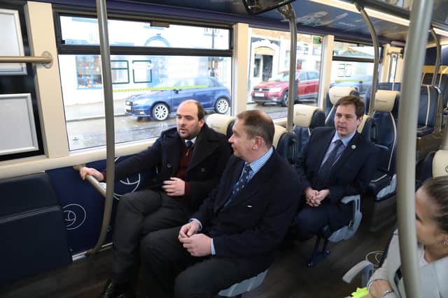 Buses minister Richard Holden MP on the X4 with Philip Hollobone MP at Horsemarket Kettering