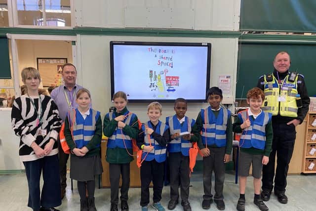 Keith Millard, Senior Road Safety Officer for Kier Highways, and Mike Bowes, Community PCSO, with the Hawthorn Road Safety Heroes