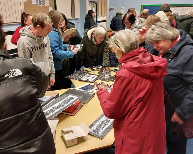 Visitors had the opportunity to browse old school photos.