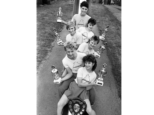 1984 TEAM WITH TROPHY