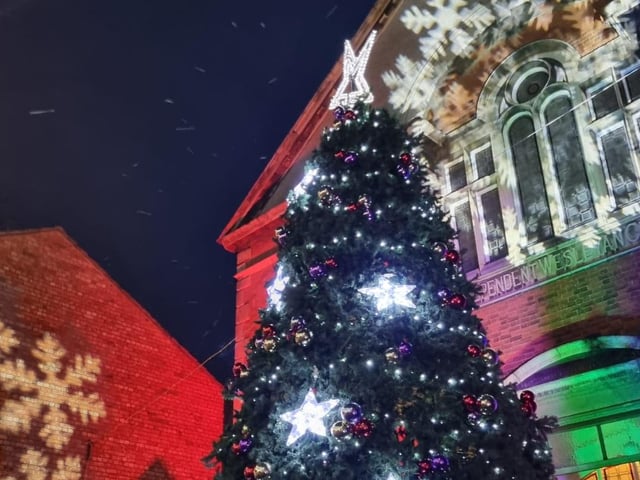 Carols were sung around the Christmas Tree