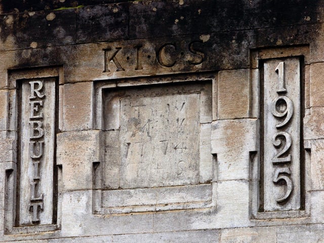 Stonework above Golden Eagle Carpets in High Street, taken in 2006