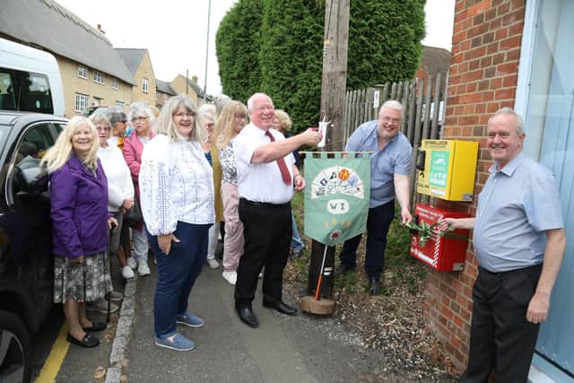 Jill Russell president of Bozeat WI, Cllr Tom Partridge-Underwood, Cllr Jon-Paul Carr and Cllr Martin Griffiths with the bleed kit at the Nisa shop in London Rd, Bozeat/National World