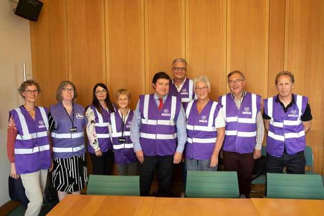 The Wombles from across West Northamptonshire with their MP, Andrew Lewer.