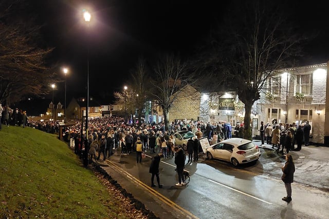 Earls Barton celebrates Christmas Eve in the Square - People flooded the village up to The Old Swan